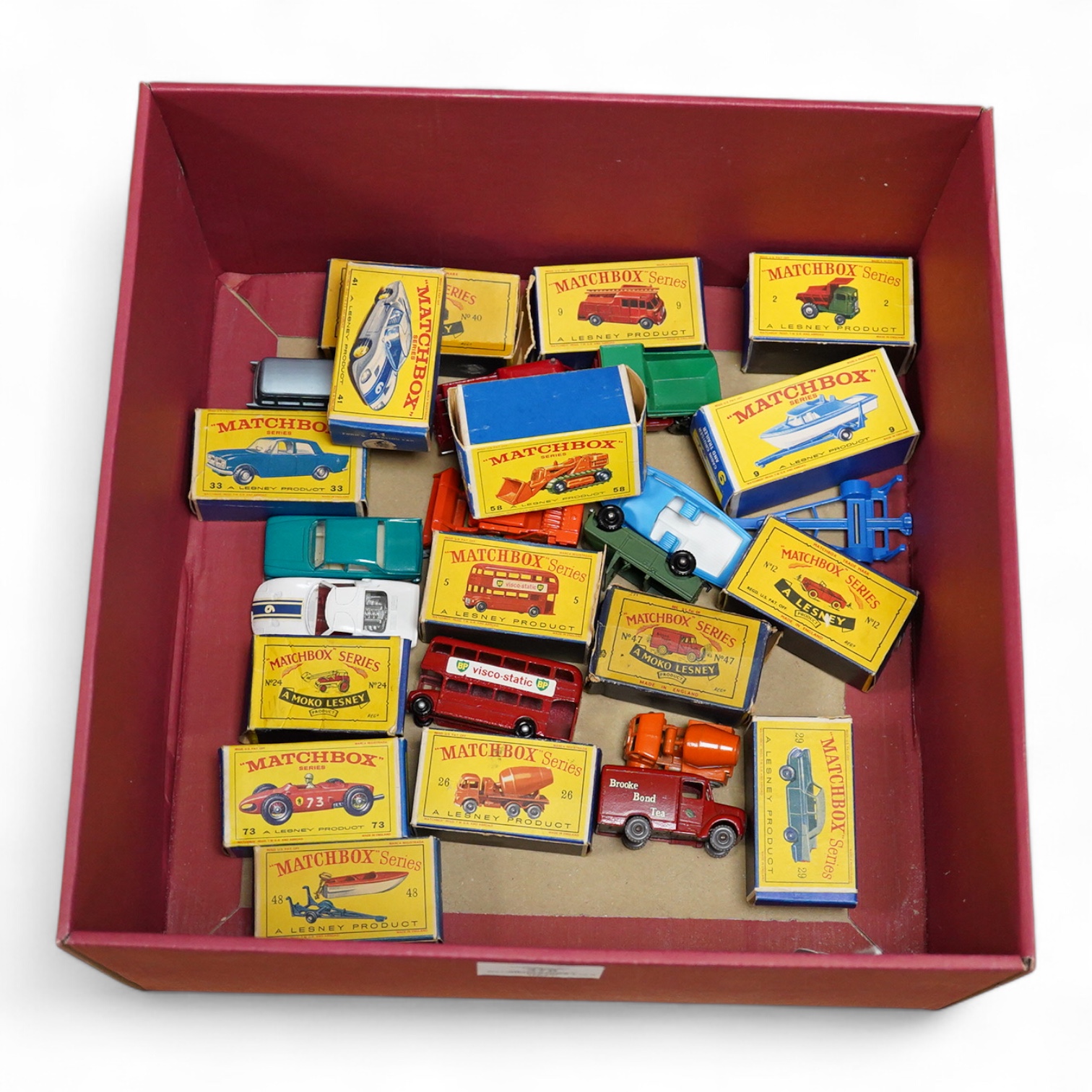 Fifteen boxed Matchbox Series 1-75 regular wheels vehicles including; Trojan van (47), Routemaster bus (5), Cement Lorry (26), Ford G.T. Racing Car (41), Ford Zephyr (33), Long Distance Coach (40), etc.